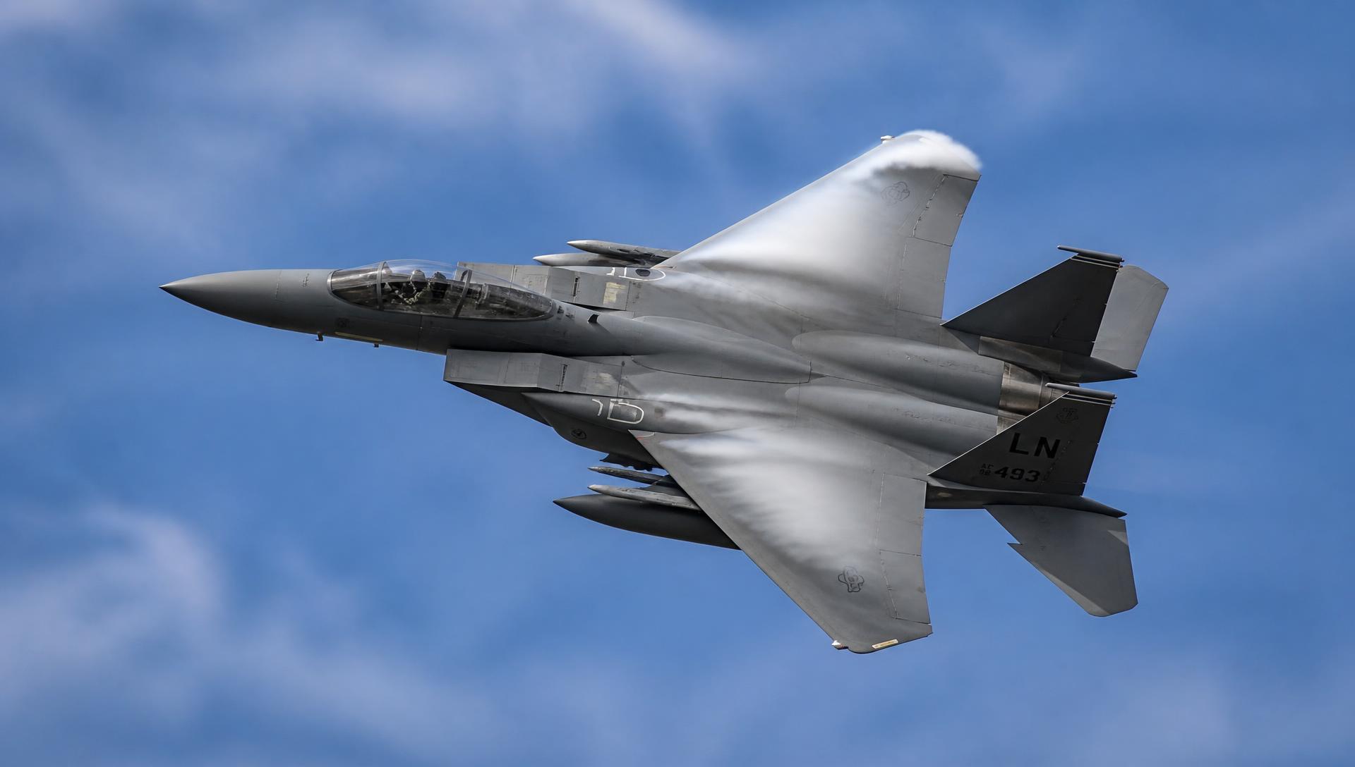 F-15 Eagle banking hard at altitude